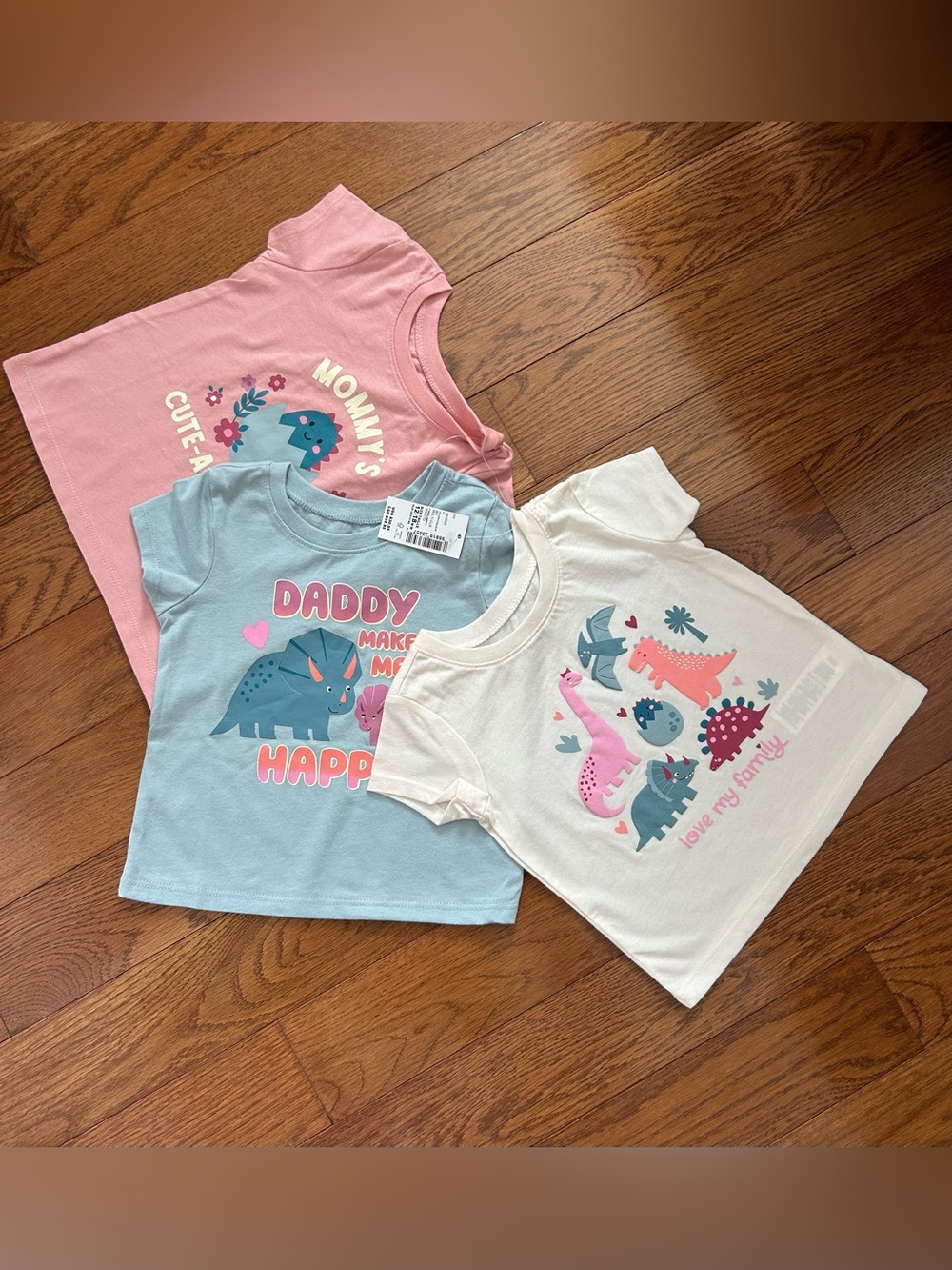 Set of The Children’s Place 12-18M Girl Dinosaur Graphic Tees Pink, Blue, Cream